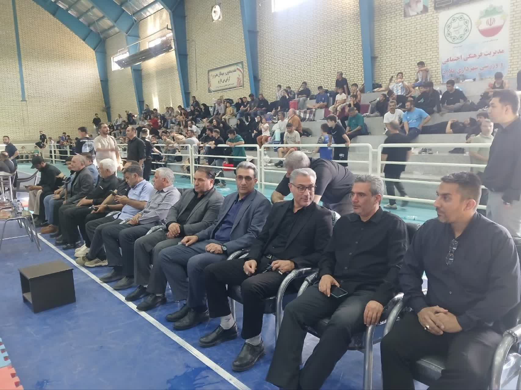 مسابقات کشتی یادواره شهید کاشفی در گلزار شهدای ملارد برگزار شد